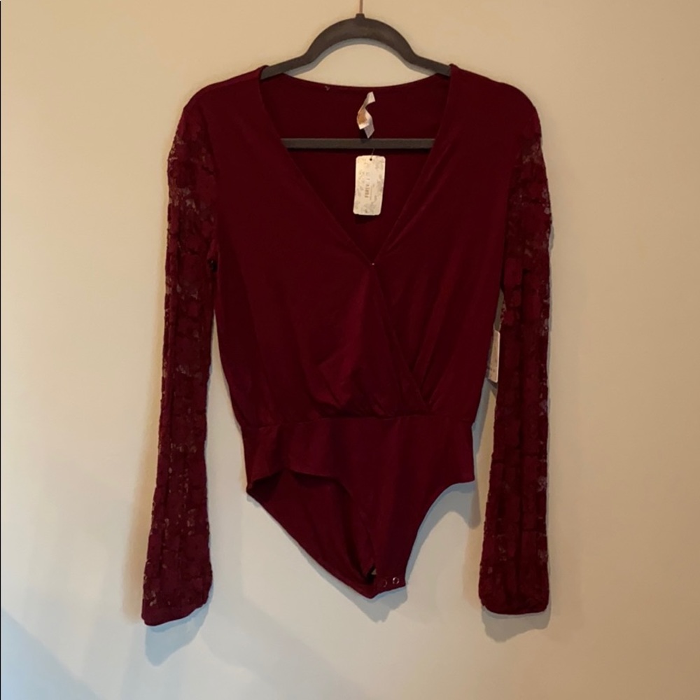 Lace sleeve body suit